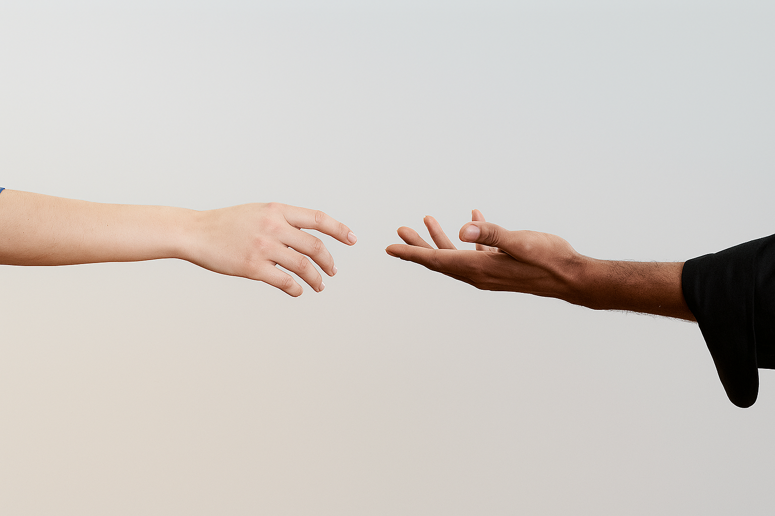Hands raised in welcome, symbolizing connection